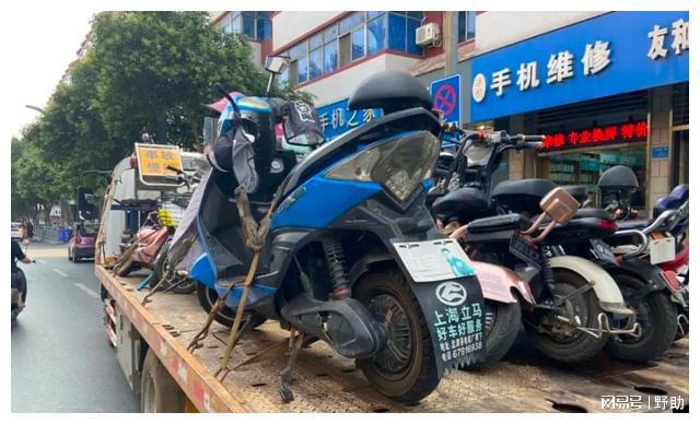 交警拖车电话图片